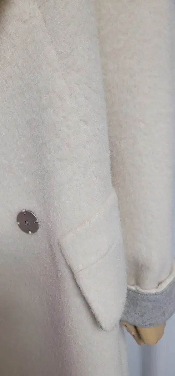 クリーム色コート ほぼ