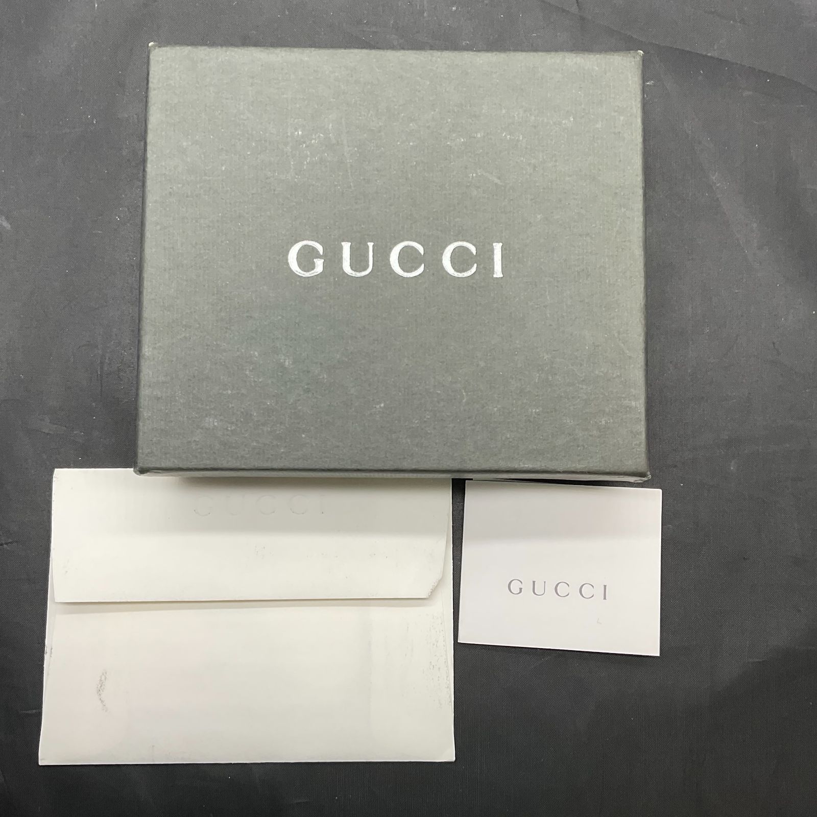 グッチ 二つ折り財布