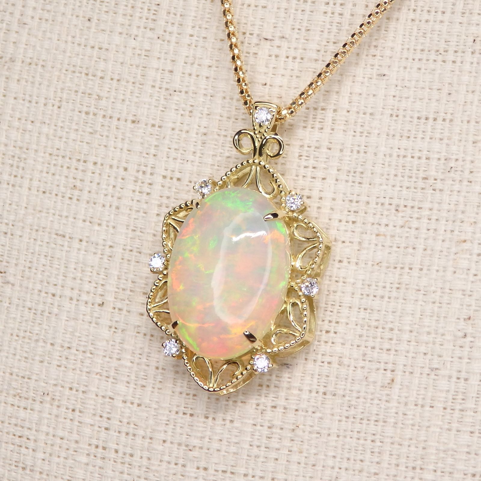 オパール ペンダントTOP Z 5377 5.38 ct ゴールドK 18 オーバル 小判 遊色効果 ミル打ち 大粒 ソーティング付き