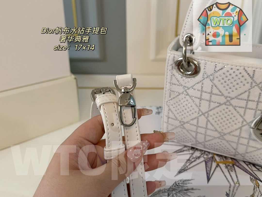 キャンバスとスパークルストーンのハンドバッグ で今の在庫は