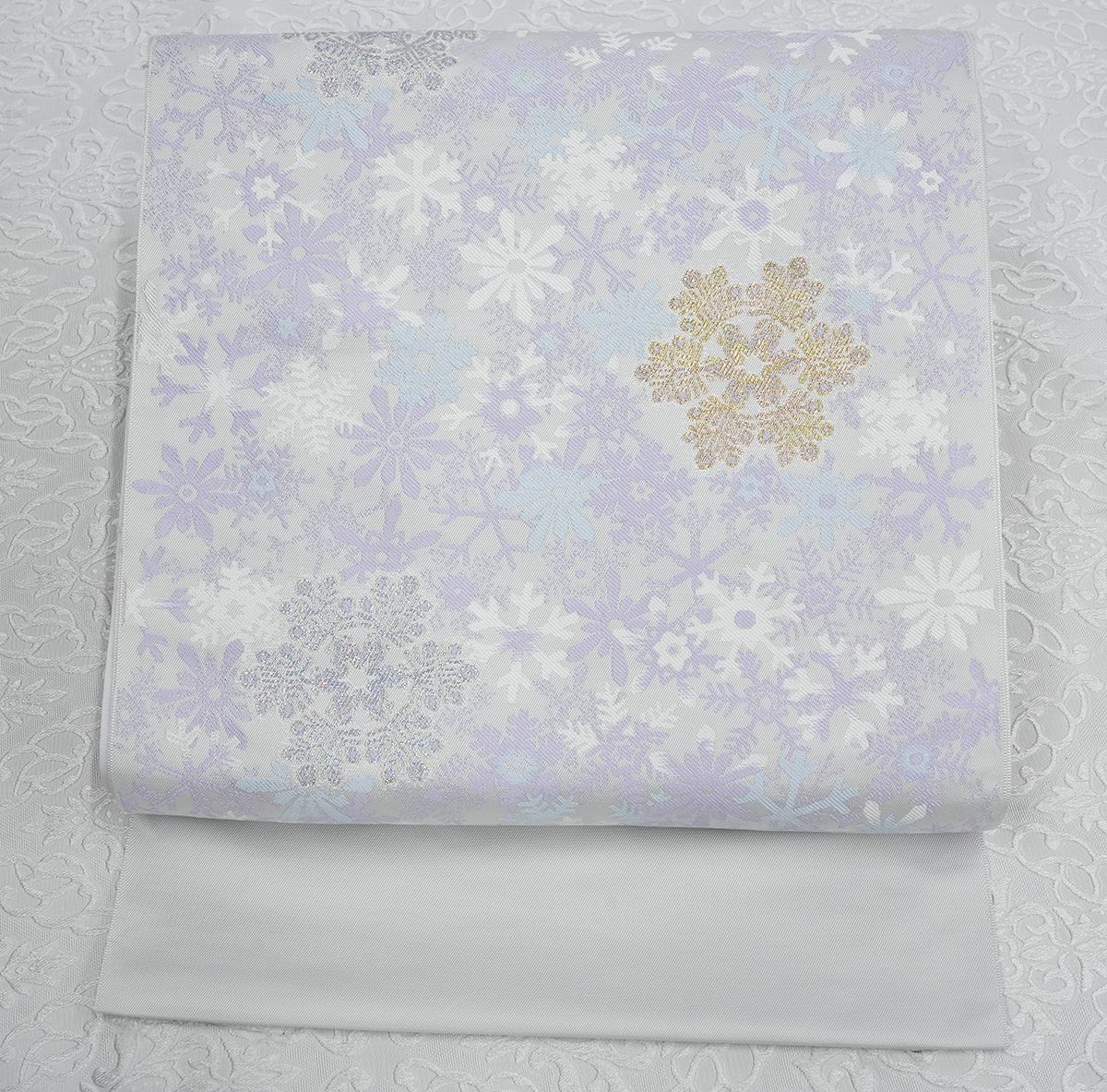 未仕立 西陣織 九寸名古屋帯 雪の結晶柄 オフホワイト