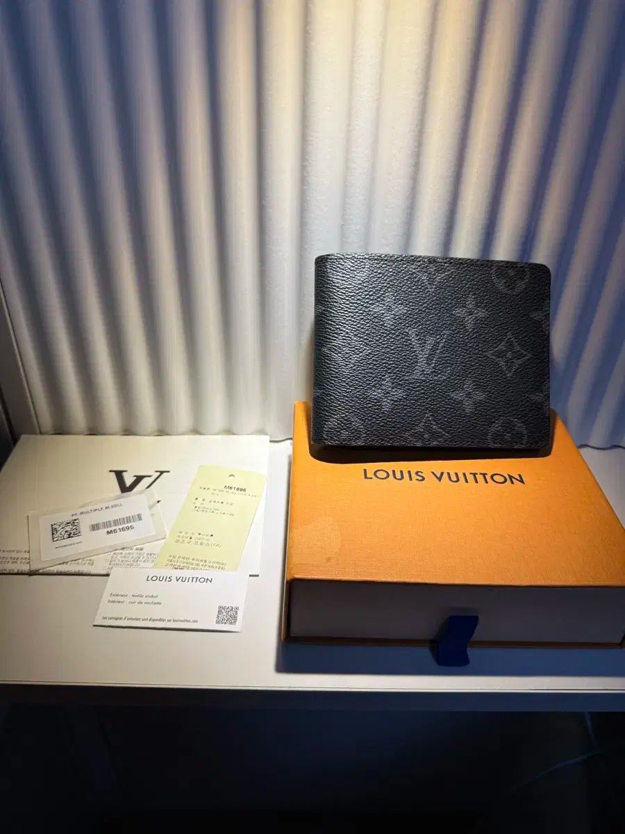 1回 ルイヴィトン エクリプス ミュルティプリ マルチ 二つ折り財布