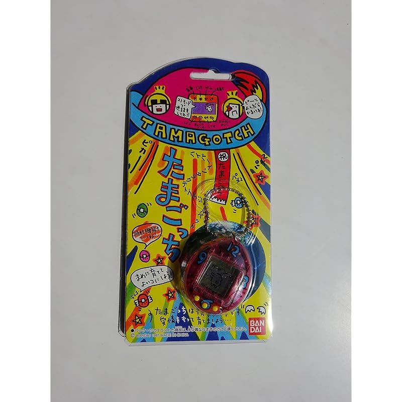 バンダイ 初代 たまごっち スケルトンピンク色 時計柄