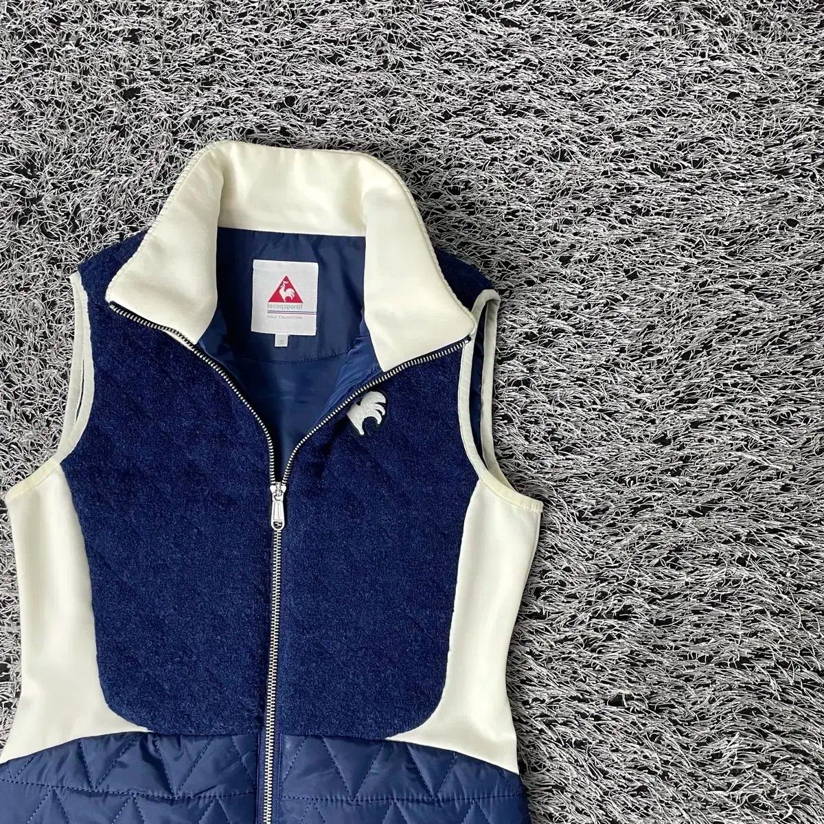le coq sportif ルコックスポルティフ ゴルフ レディース ニット バイ スリーブレス パデッド ジャケット