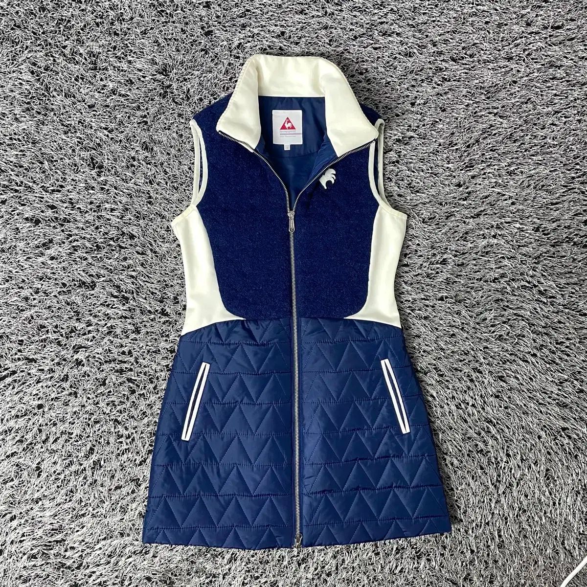 le coq sportif ルコックスポルティフ ゴルフ レディース ニット バイ スリーブレス パデッド ジャケット