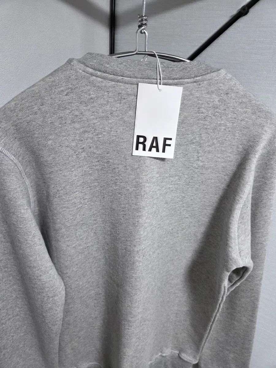 멜린지 スウェットシャツ