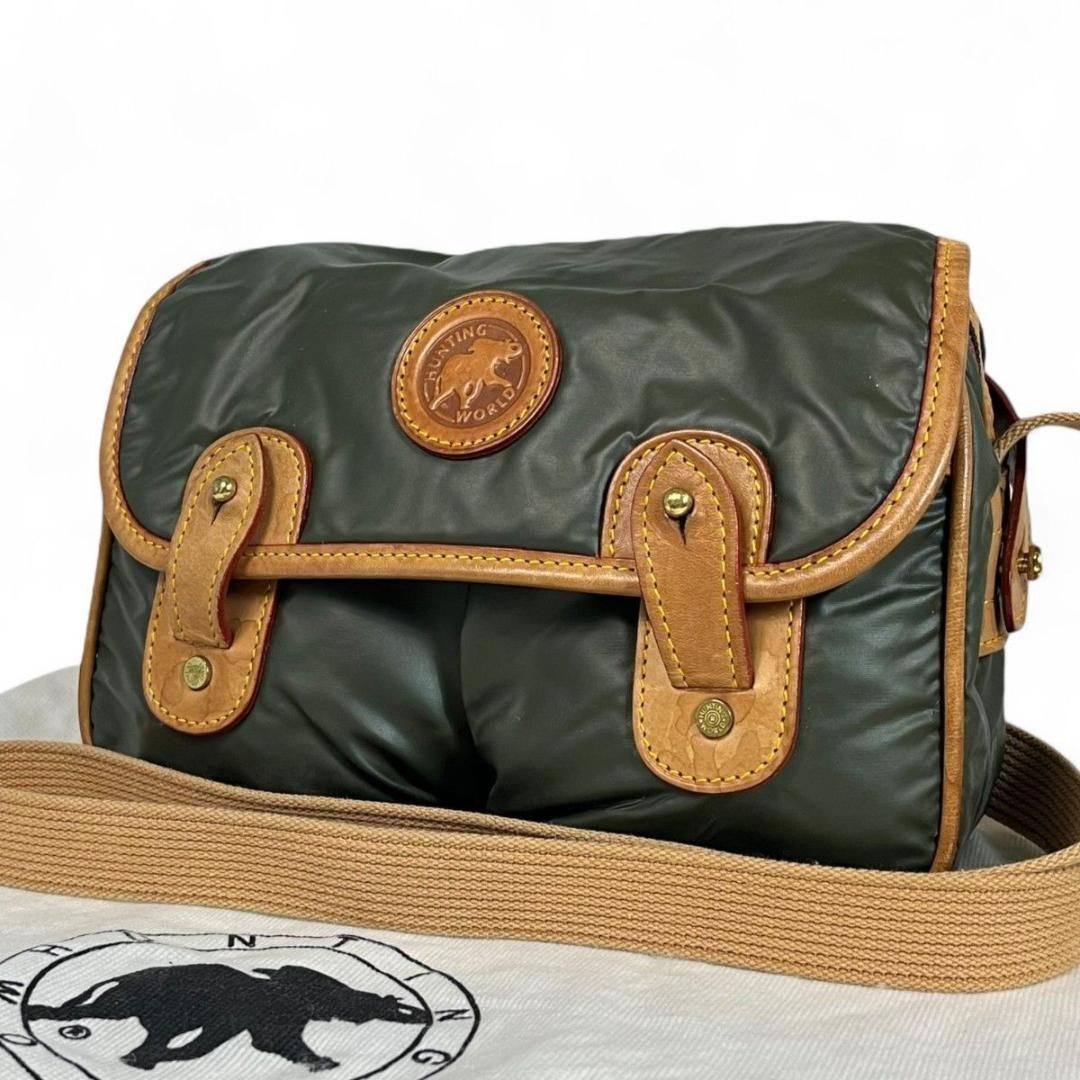 美品 HUNTING WORLD バチュークロス カーキ 斜め掛け レザー - メルカリ