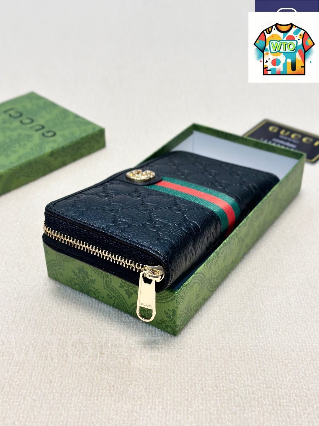 今日 Gucci グッチ シングルジッパーハンドウォレットシリーズ 頭層牛皮プレス柄を採用し質感に優れる