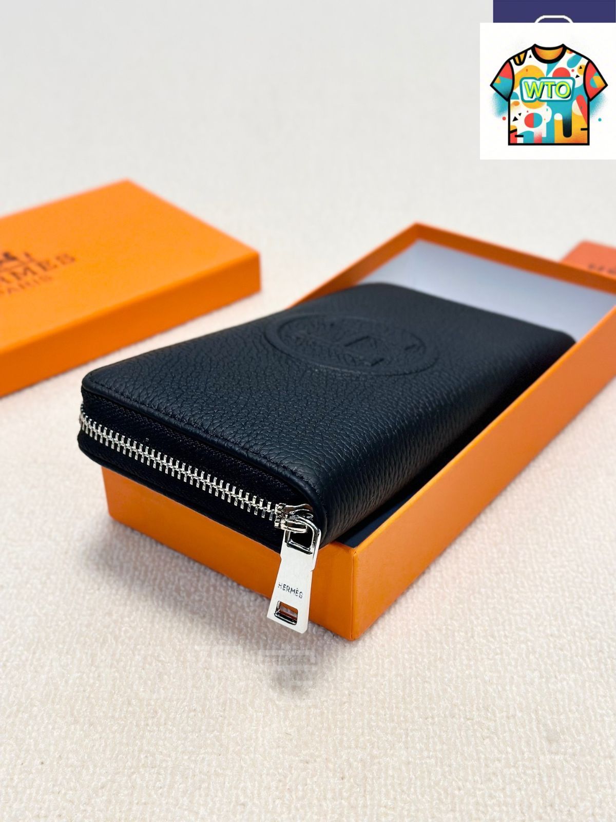 今日 Herm s エルメス ハンドウォレットシリーズ 牛皮プレス柄を採用し質感に優れる