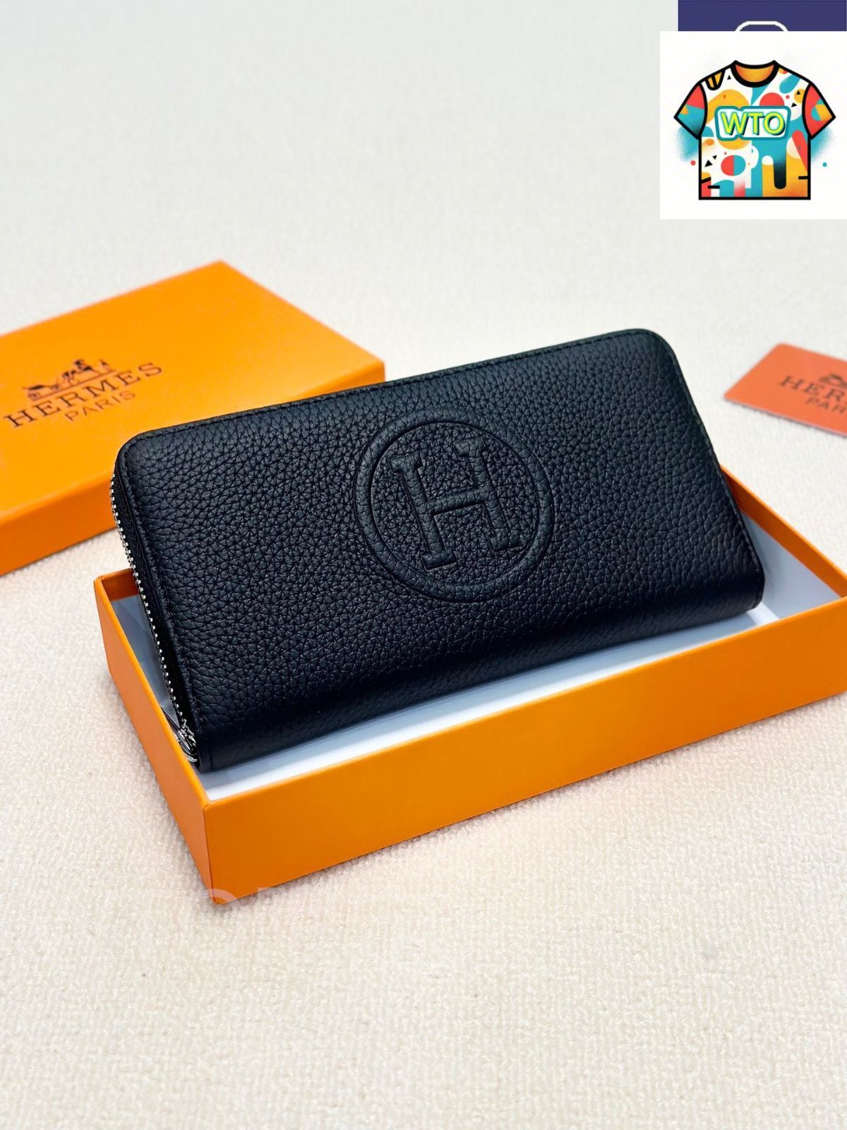 今日 Herm s エルメス ハンドウォレットシリーズ 牛皮プレス柄を採用し質感に優れる