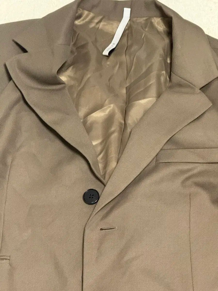 ノイア ブラウン ロング コート 50