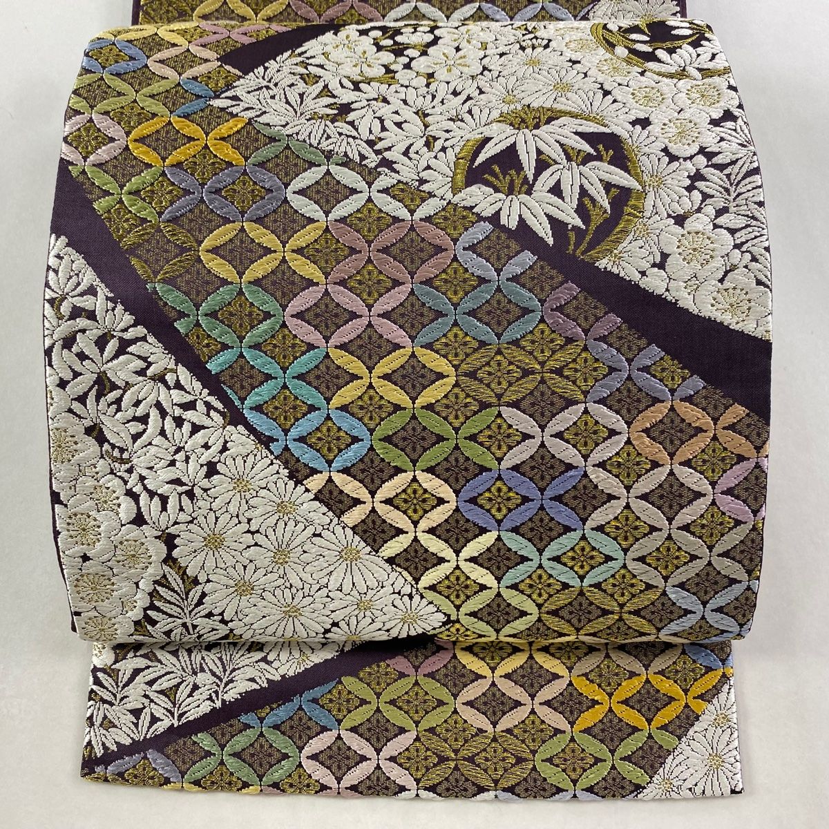 袋帯 名品 草木染 つづれ唐織 七宝繋ぎ 花丸文 金糸 紫 六通 正絹