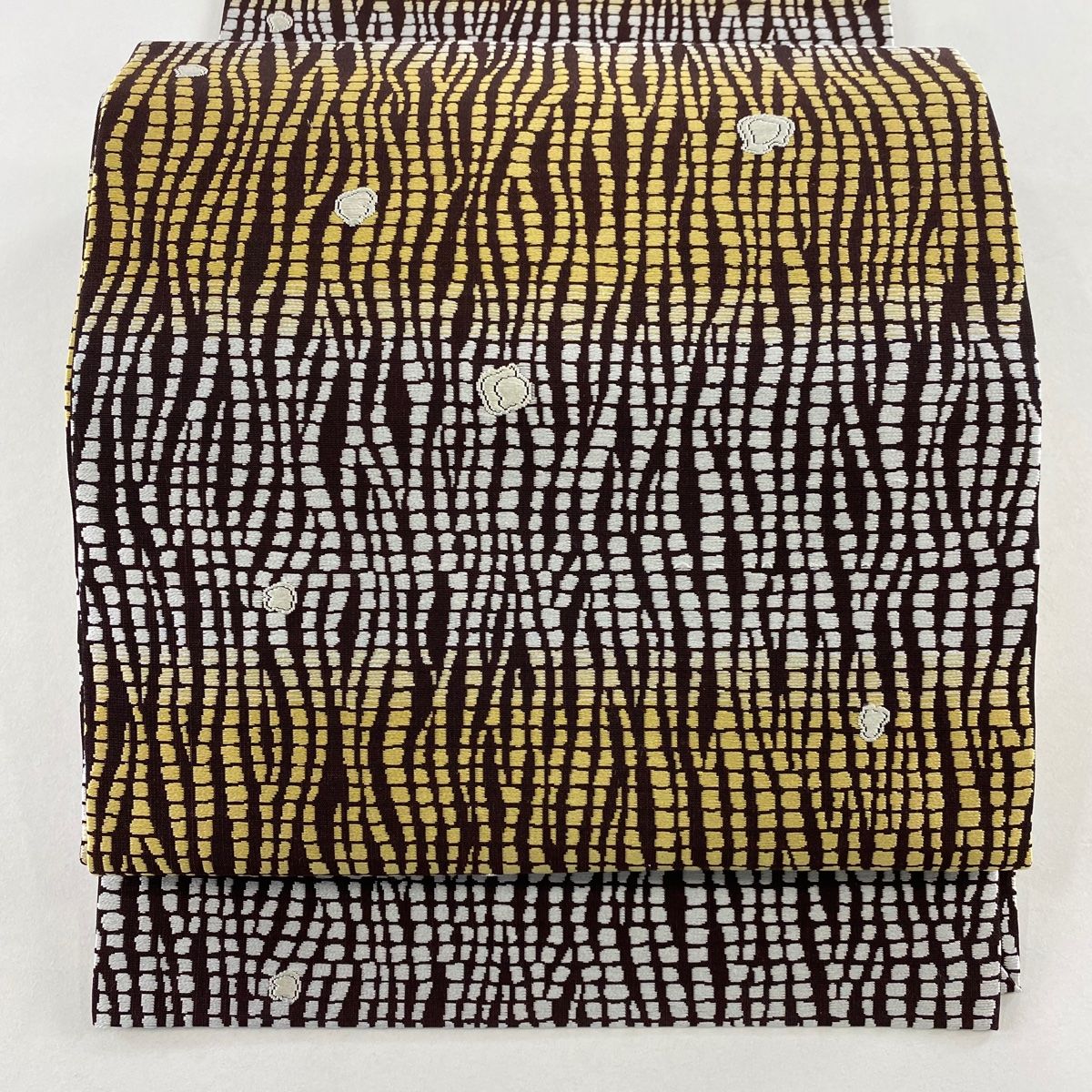 開き名古屋帯 秀品 喜鳳泉 幾何学 焦茶色 正絹