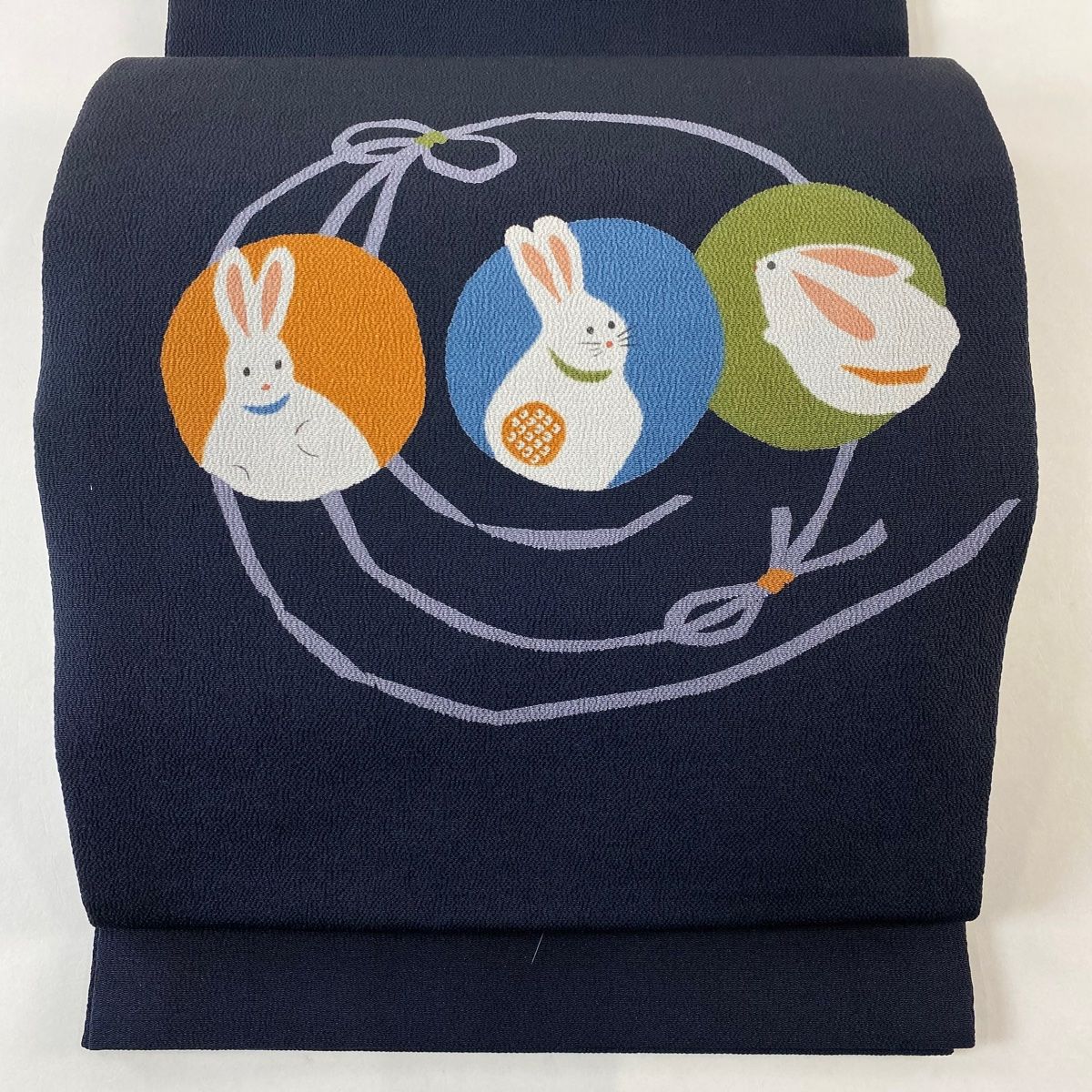 開き名古屋帯 うさぎ 組紐 縮緬 黒 正絹