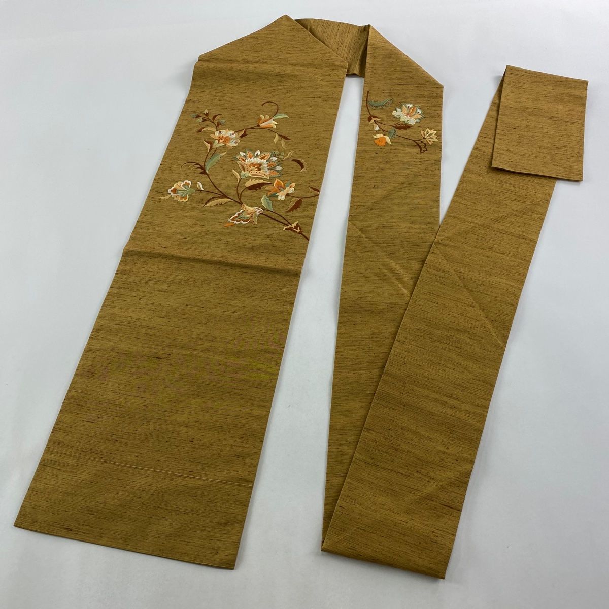 名古屋帯 秀品 紬地 草花 刺繍 山吹茶色 正絹 【中古】 - メルカリ