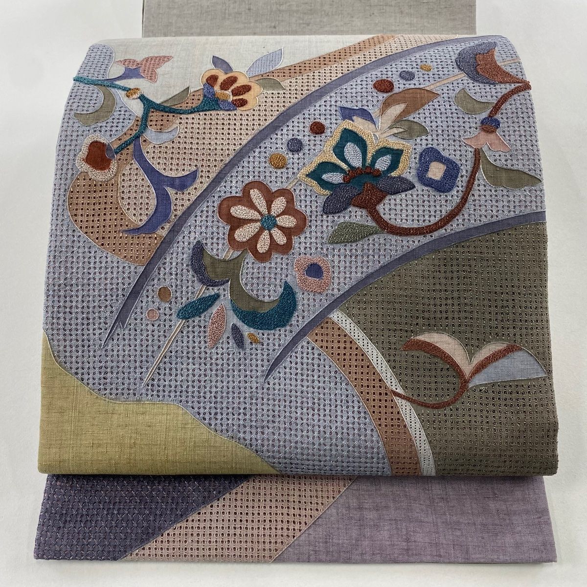 袋帯 秀品 紬地 草花 幾何学模様 刺繍 青灰色 お太鼓柄 正絹