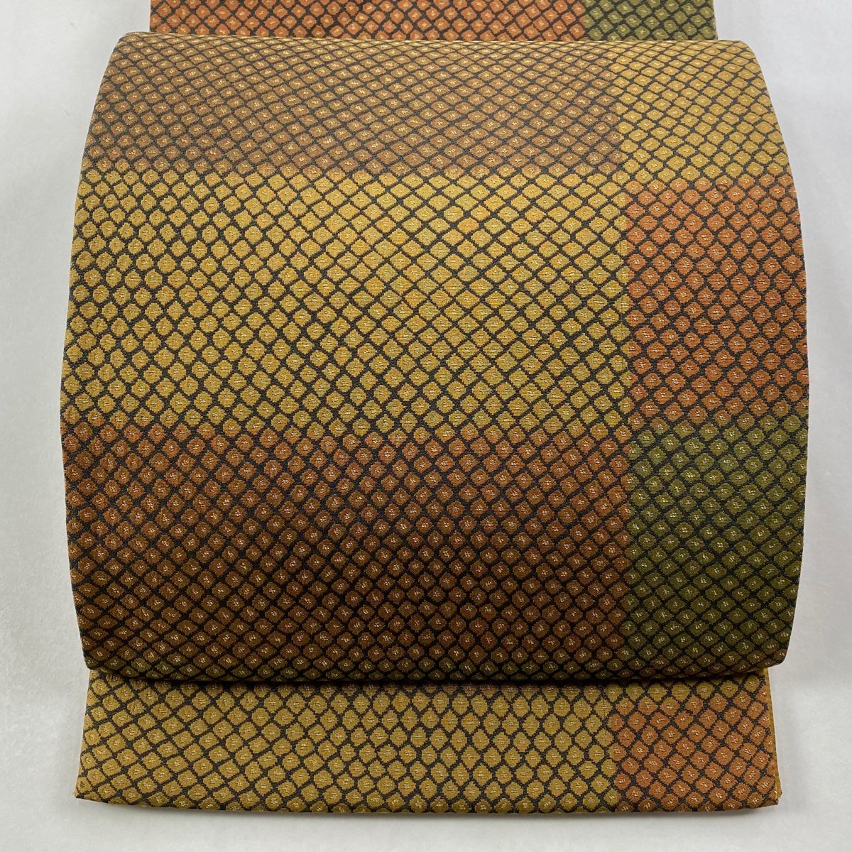 袋帯 秀品 幾何学 変わり市松 茶色 全通 正絹