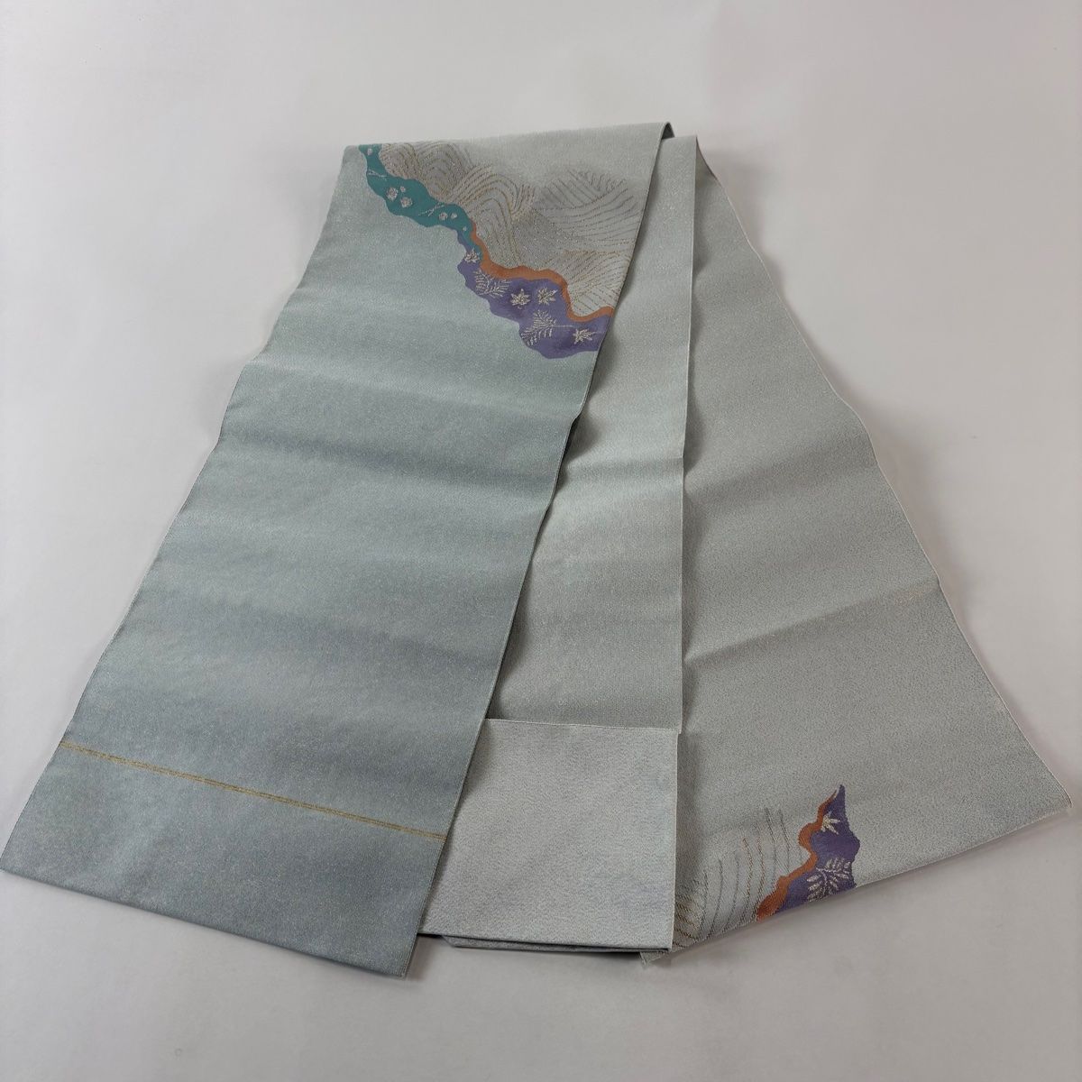  名古屋帯 証紙 道長取 波 金銀糸 綴れ 水色 正絹 名古屋帯 帯