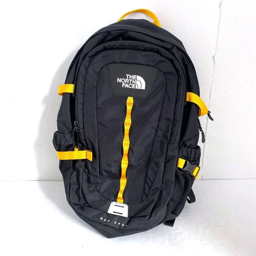 03w22061 THE NORTH FACE ザ ノース フェイス Hot Shot ホットショット ブラック イエロー 黒 黄 ユニセックス リュック デイパック NM72302