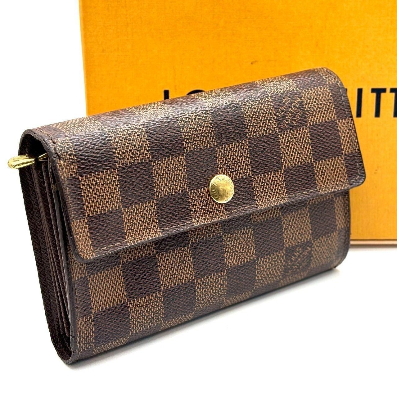 品格と機能美を一つに LOUIS VUITTON ルイヴィトン 三つ折り財布 ダミエ ポルトフォイユ アレクサンドラ PVC レザー N63067 ブラウン