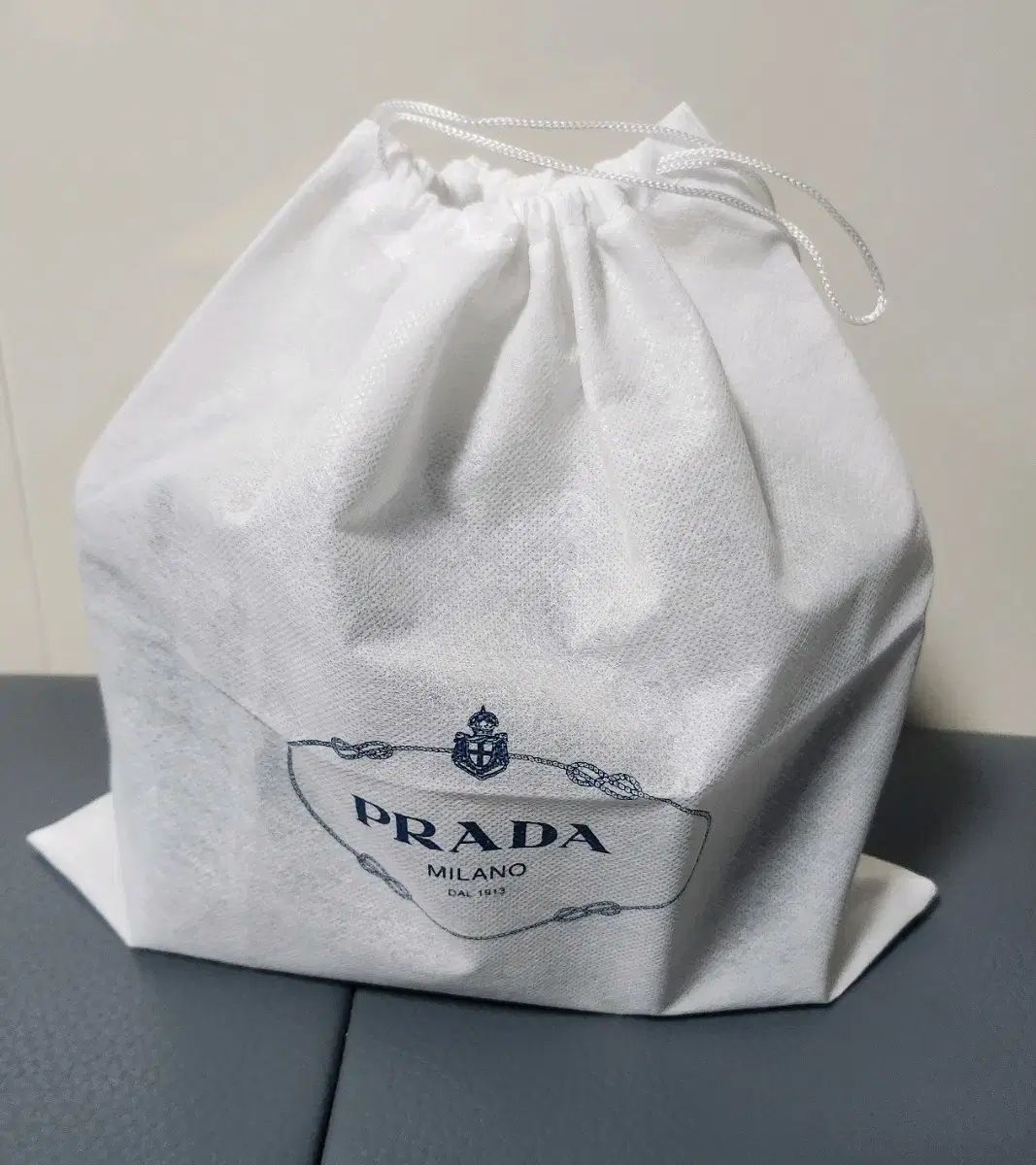 プラダ ミニトライアングルロゴ