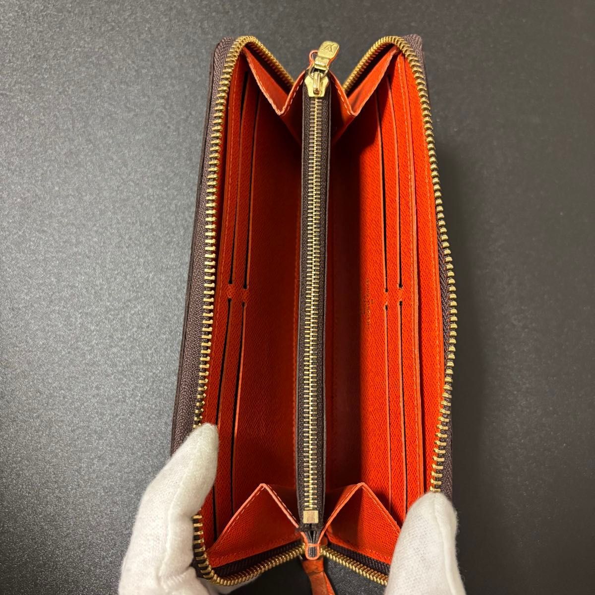 新品に近い ルイヴィトン クレマンス オレンジ 長財布 ジッピー