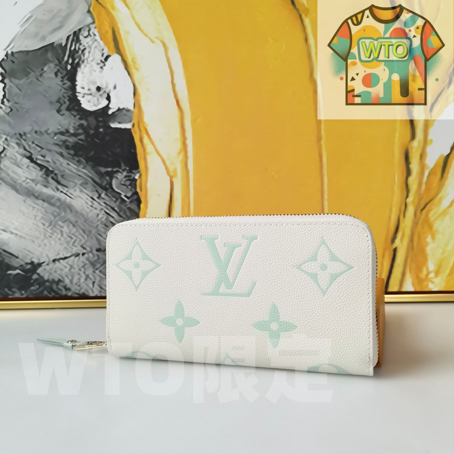 LVルイ ヴィトン 財布は柔らかい革で作られている エンボスアルファベットの図案は2種類の精緻で柔らかい色で際立っている 実用的な内部デザインが見え 複数のポケット 仕切り 12のカード位置が付いています -WT0輸入