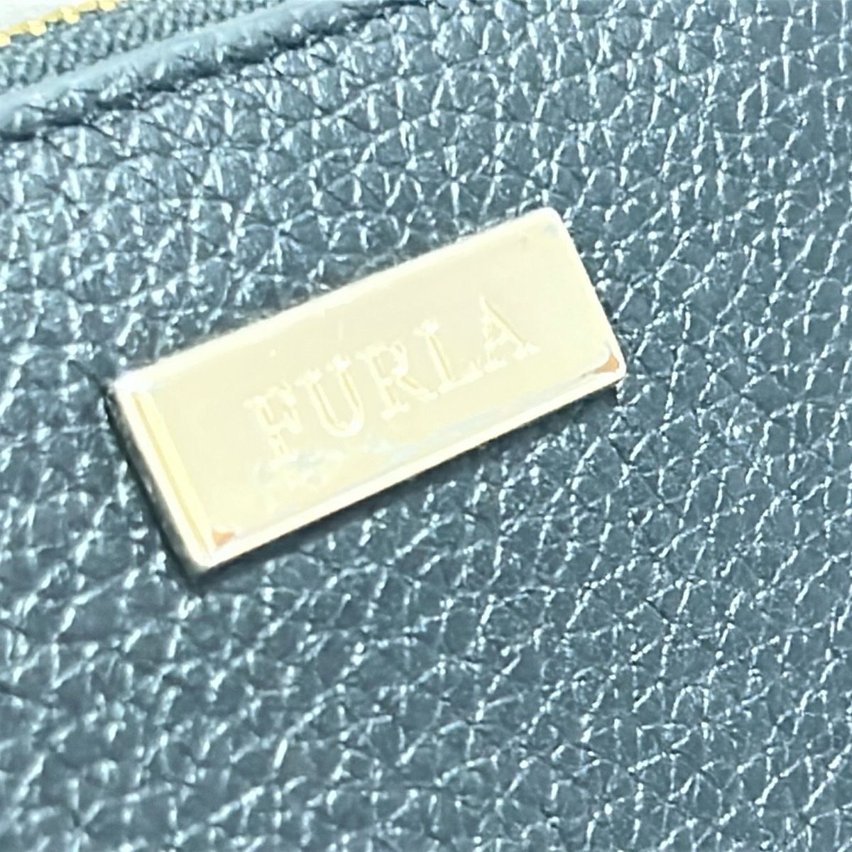 黒 ラウンドファスナー