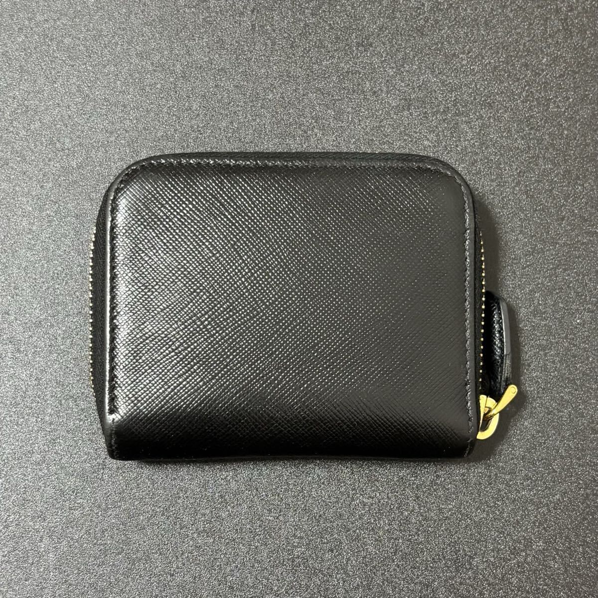 PRADA プラダ コインケース 黒 レザー 楽天市場】PRADA プラダ コインケース 2MM003 QHH レディース サフィアーノ レザー  カードケース 小銭入れ ミニ財布 トライアングルロゴ F0002/NERO : インポートセレクトmusee プラダ PRADA トライアングルロゴ  コインケース 小銭 ...
