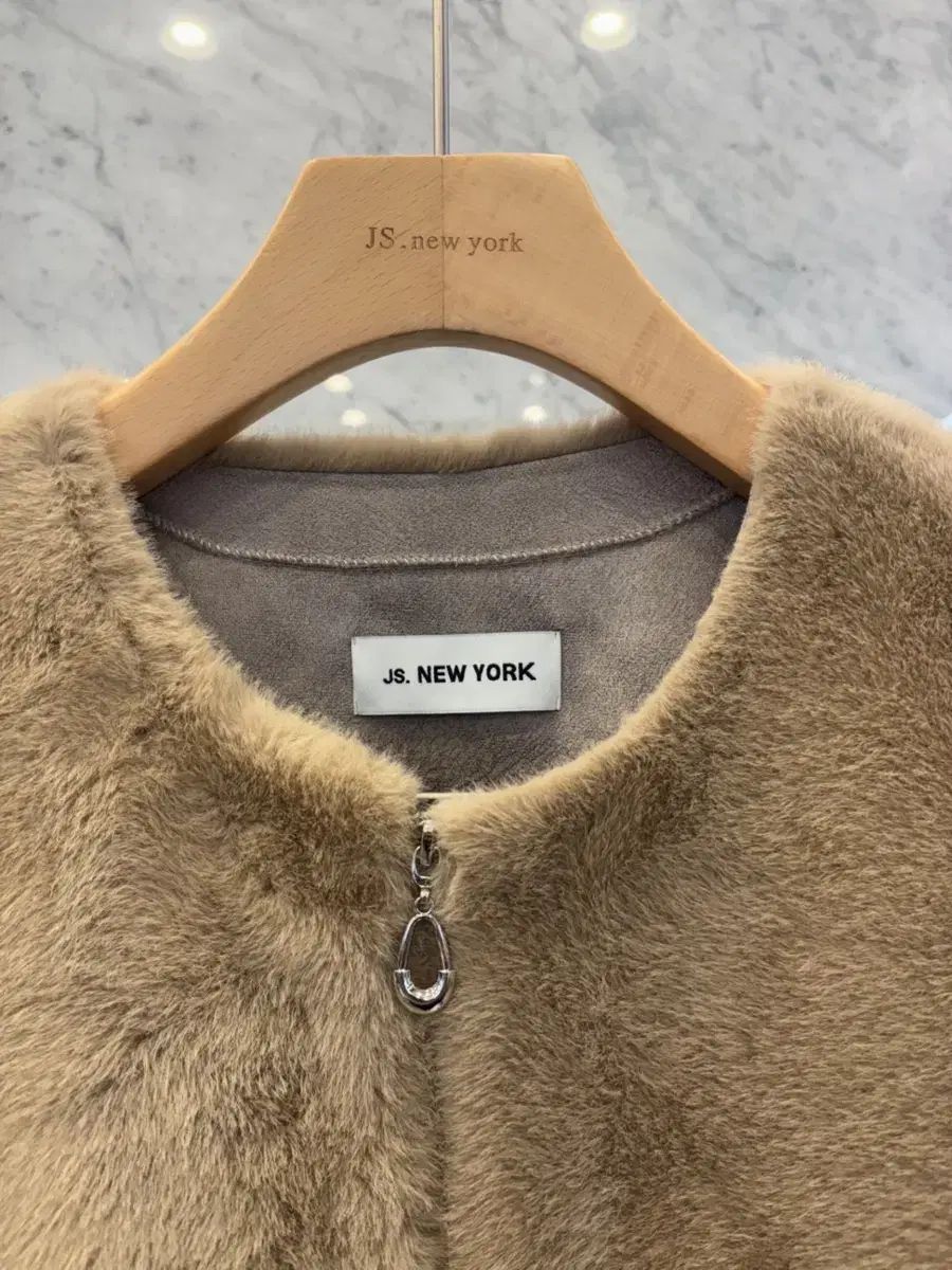 裾シャーリング ジップアップ