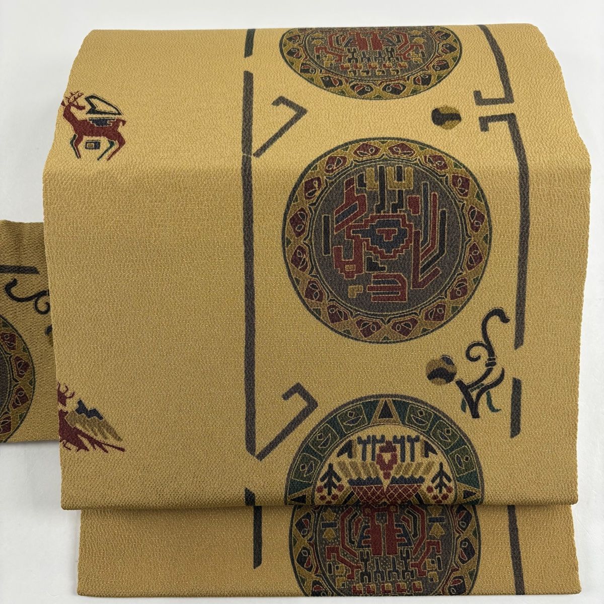 名古屋帯 秀品 丸文 動物 縮緬 薄黄土色 正絹