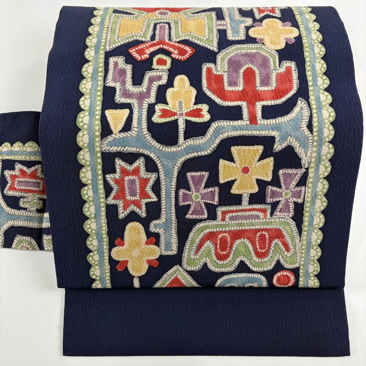 名古屋帯 秀品 花 幾何学模様 縮緬 紺色 正絹