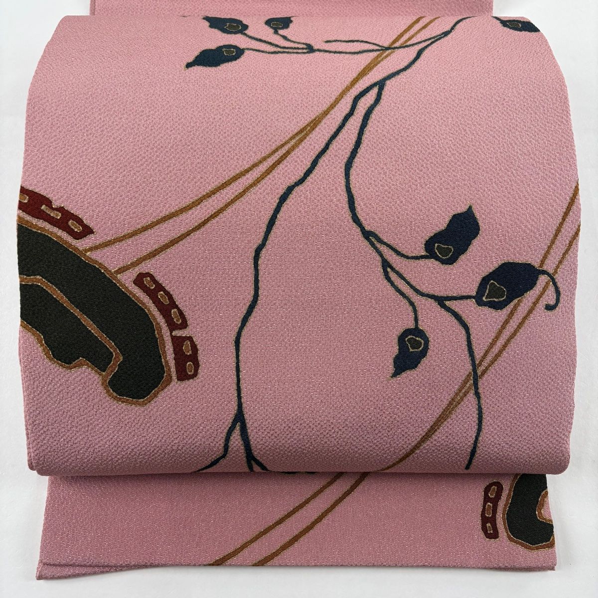 開き名古屋帯 秀品 葉柄 幾何学模様 金彩 縮緬 ピンク 正絹