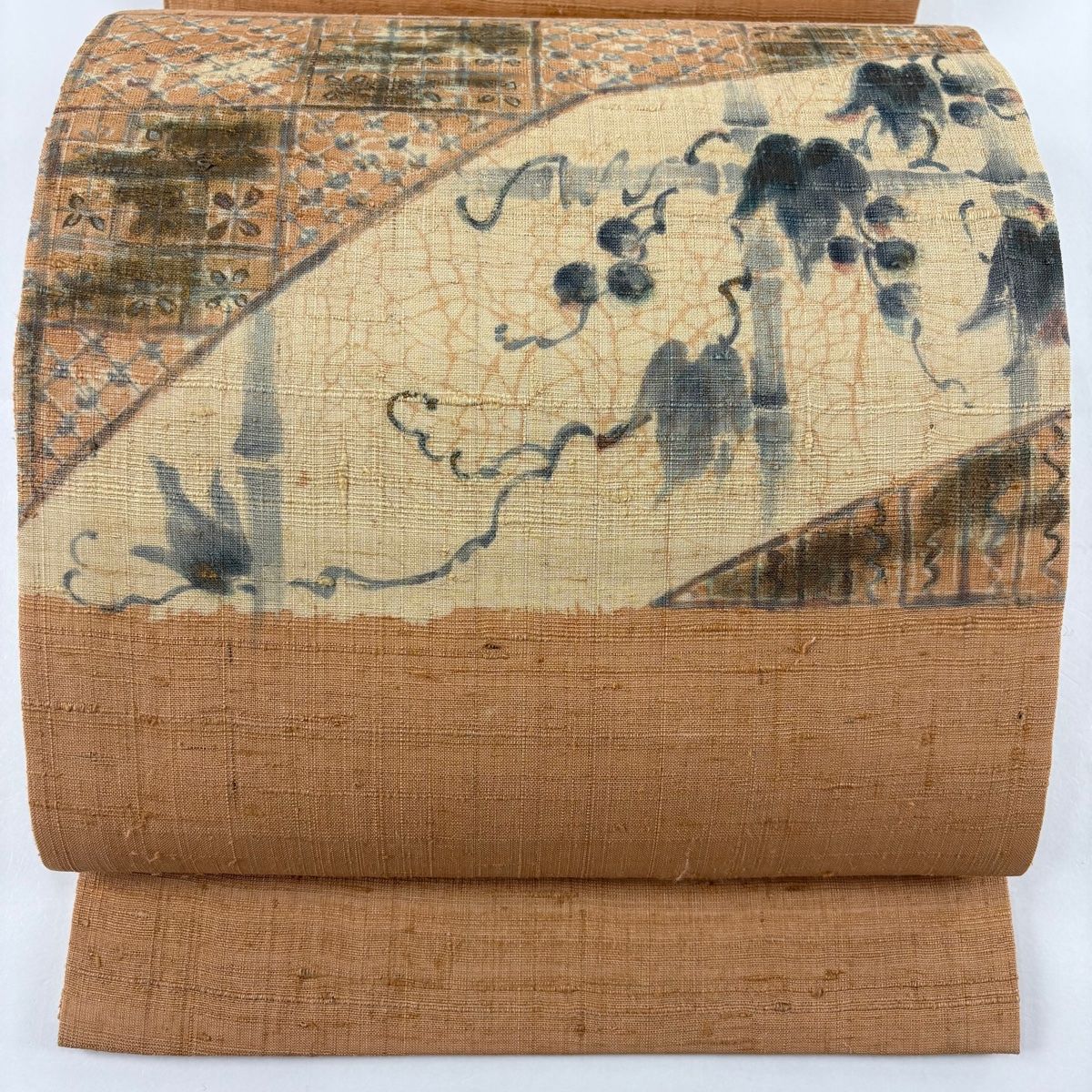 開き名古屋帯 秀品 紬地 葡萄 幾何学模様 金彩 薄オレンジ 正絹