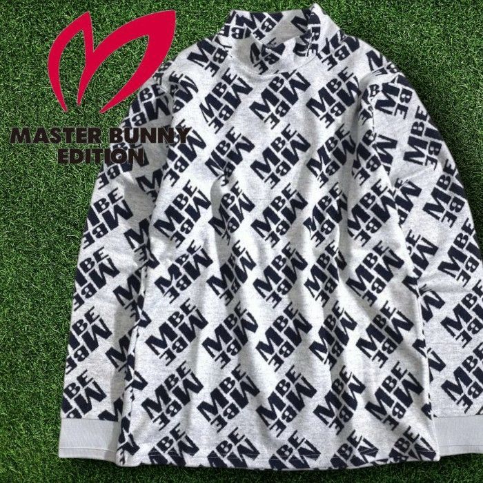 マスターバニー エディション パーリーゲイツ ゴルフ コットン混 ジャガード MBE総ロゴ 総柄 モックネック 長袖 ニットソー カットソー ゴルフウェア 758-3166003 定価1.9万 ホワイト ブラック 030 51111w08