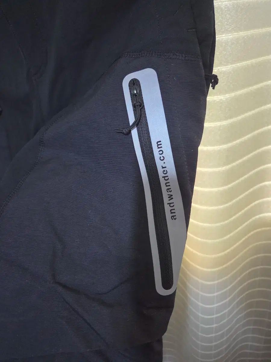 アンドワンダー ストレッチシェル パンツ ブラック