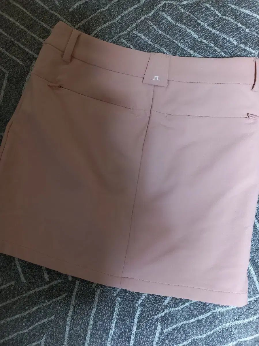 J.LINDEBERG J.リンドバーグ インディーピンク スカート