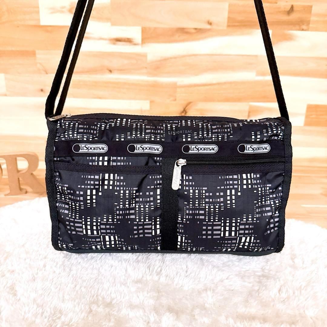 レスポートサック】クロスボディ ショルダーバッグ モノクロ 総柄 黒