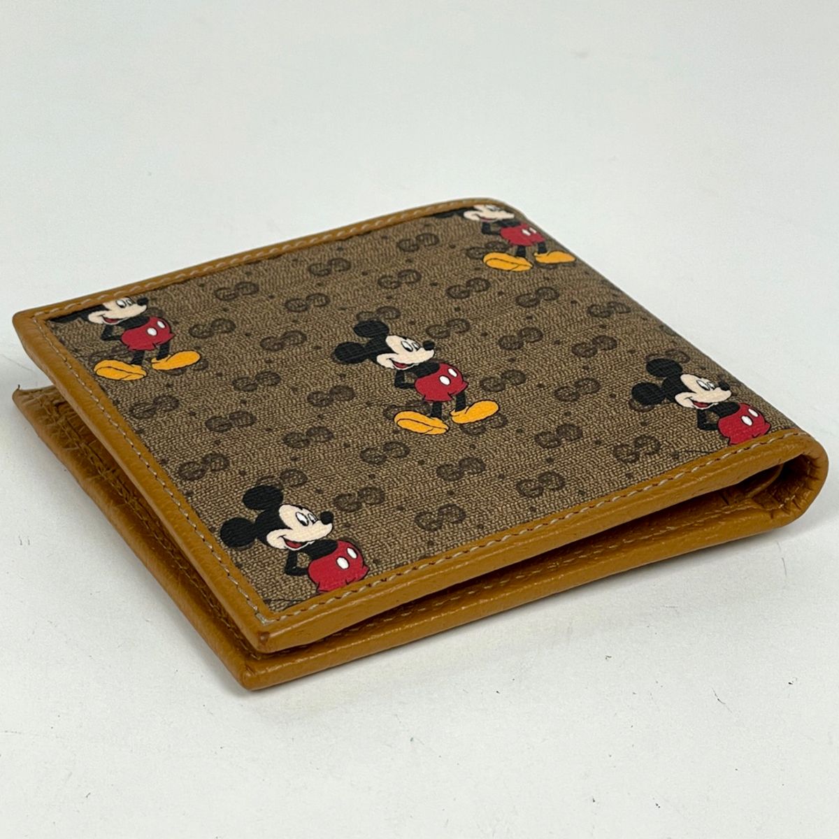GUCCI ディズニー ミッキー 二つ折り財布 【公式通販】