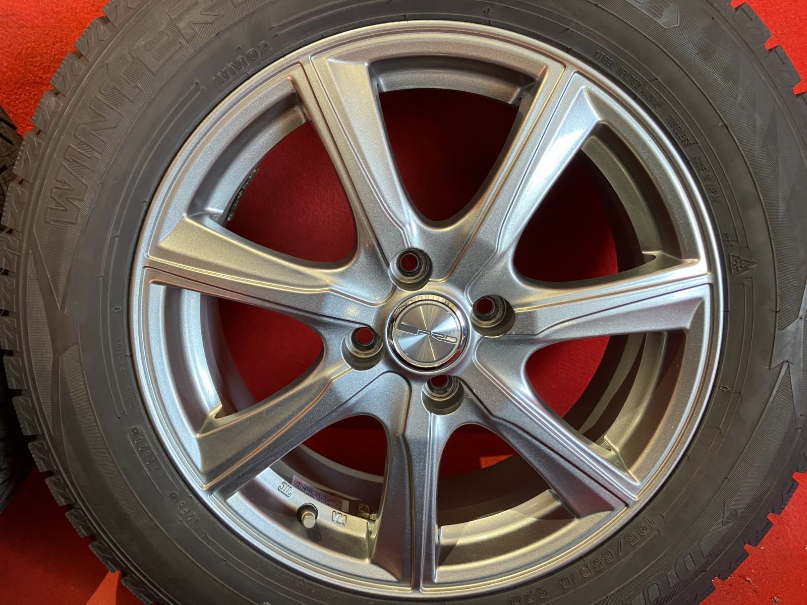 スタッドレスタイヤホイールセット 195 65 R 16 DUNLOP WM 02 x 6 0 45 100 4 H 社外 PRD 4本SET