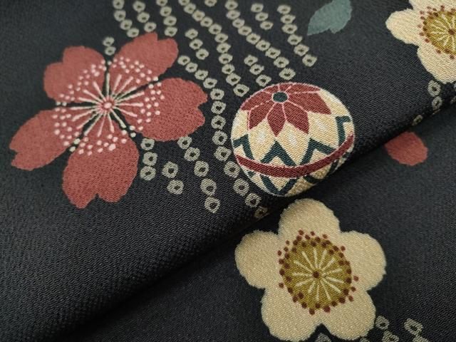 九寸名古屋帯 舞花毬文