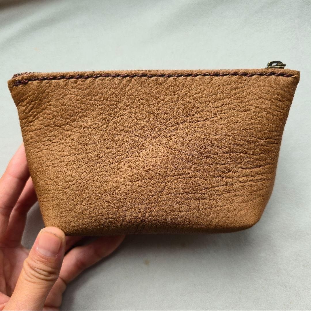 鹿革のポーチ イーグルの鹿角コンチョ