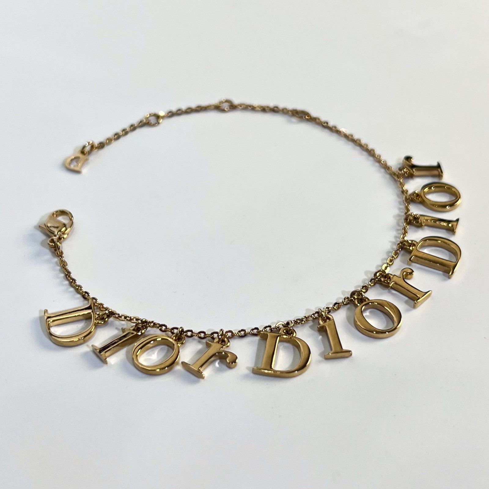 Dior ディオール ロゴ チャーム ブレスレット 22 cm ゴールド GP レディース バングル aua