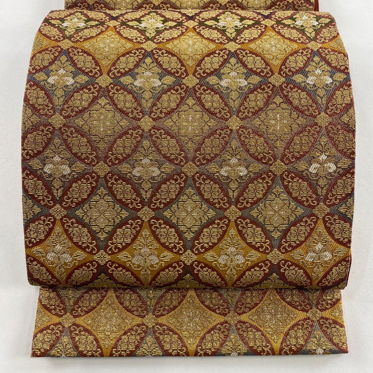 袋帯 七宝繋ぎ 草花 金糸 金色 六通 正絹