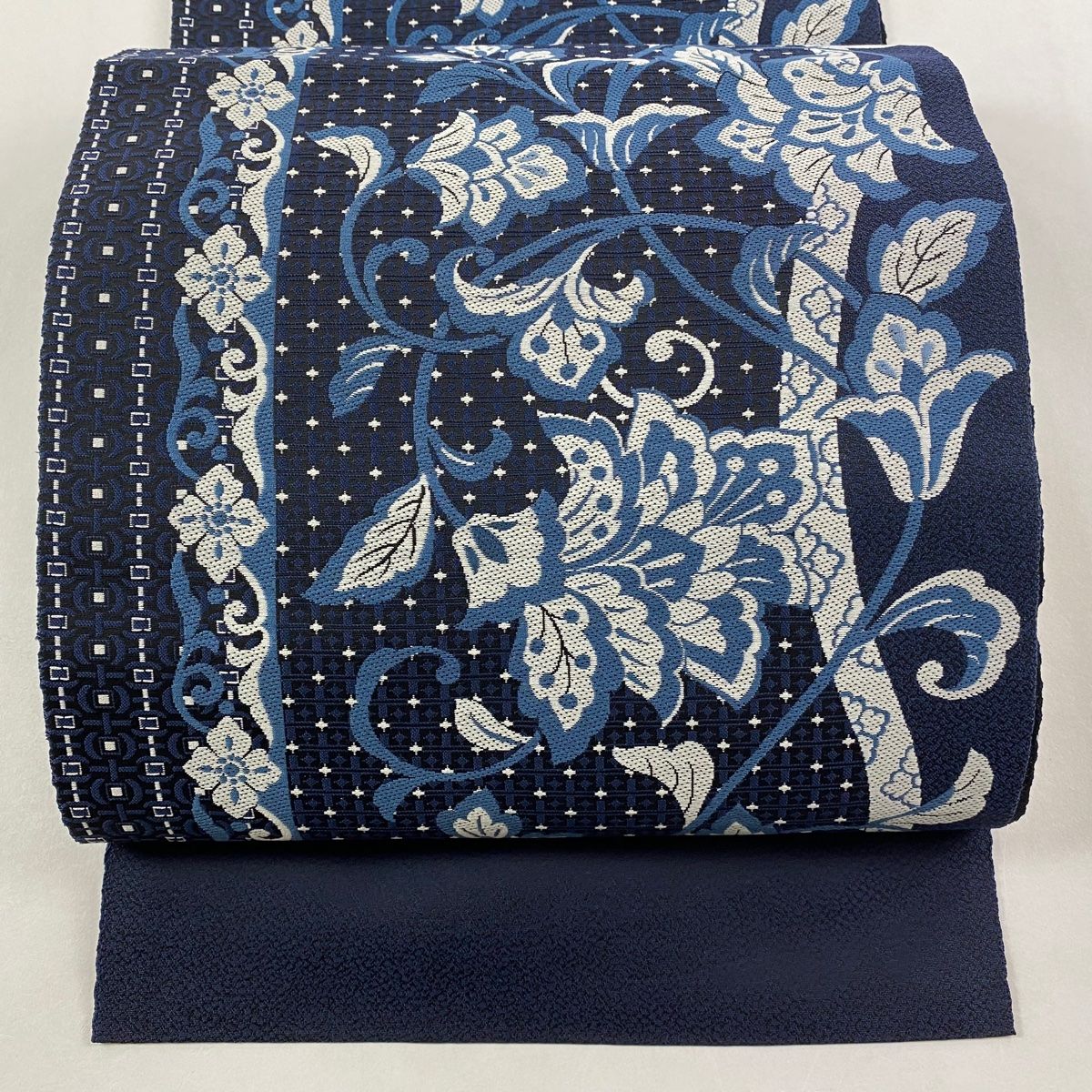 名古屋帯 秀品 松葉仕立て 八寸名古屋帯 花唐草 幾何学模様 紺色 正絹