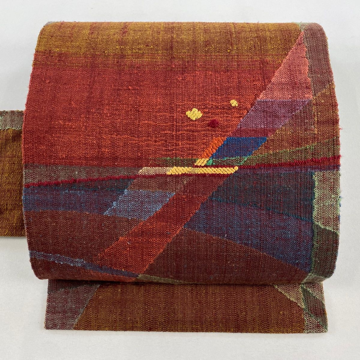 名古屋帯 秀品 紬地 幾何学模様 赤茶 正絹