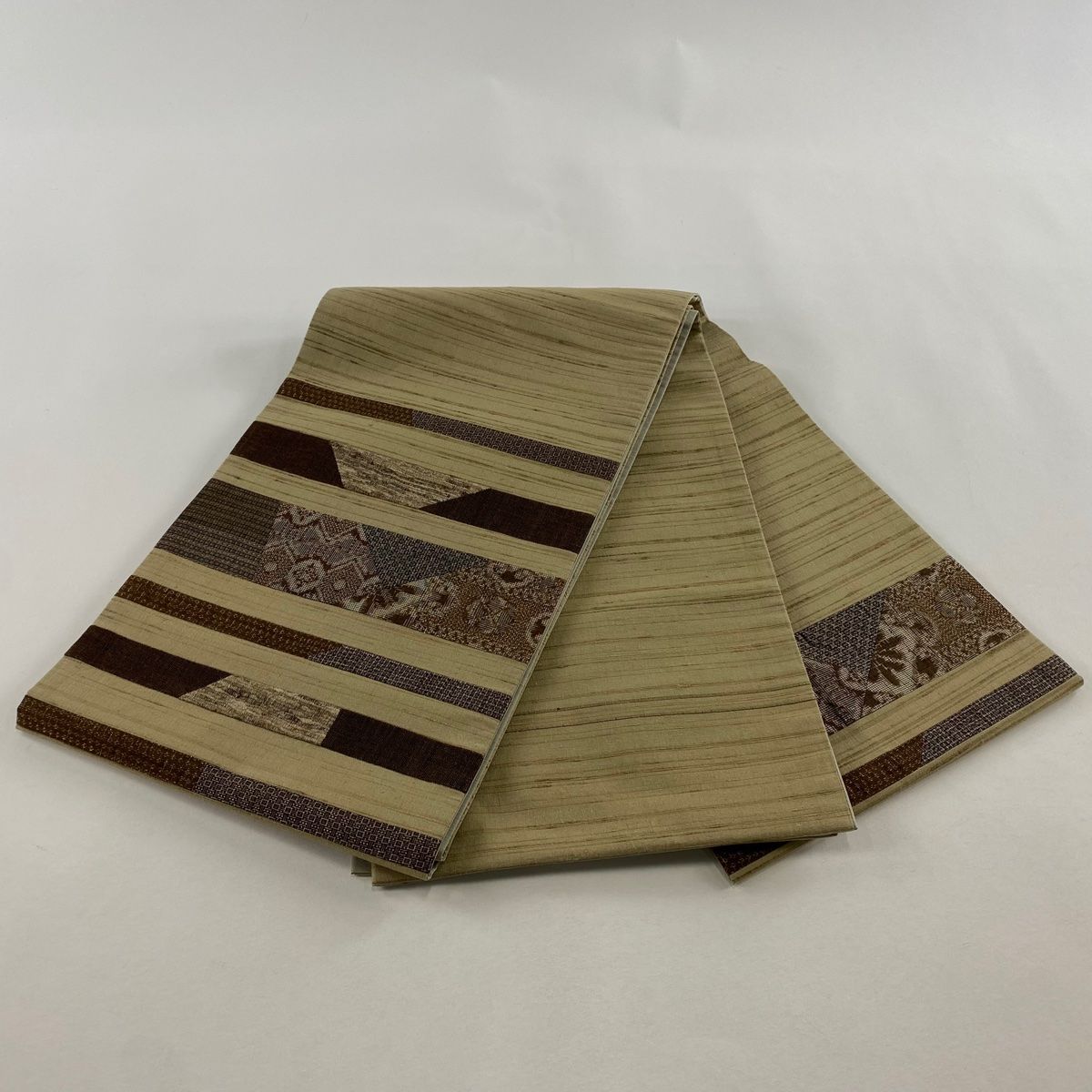  袋帯 紬地 段縞 幾何学模様 切嵌 薄茶色 お太鼓柄 正絹 袋帯 帯