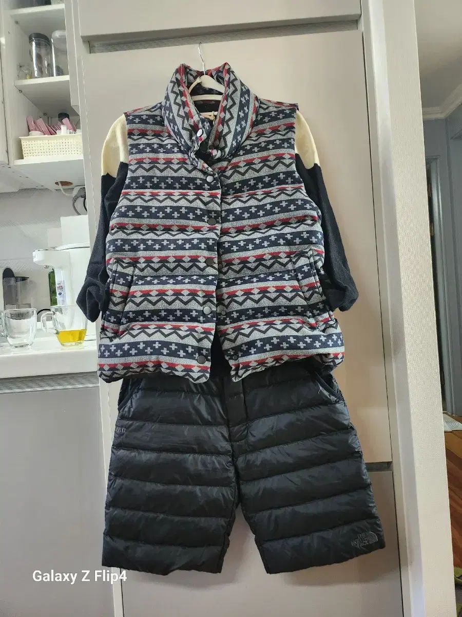 パーリーゲイツ アヒルダウンベスト