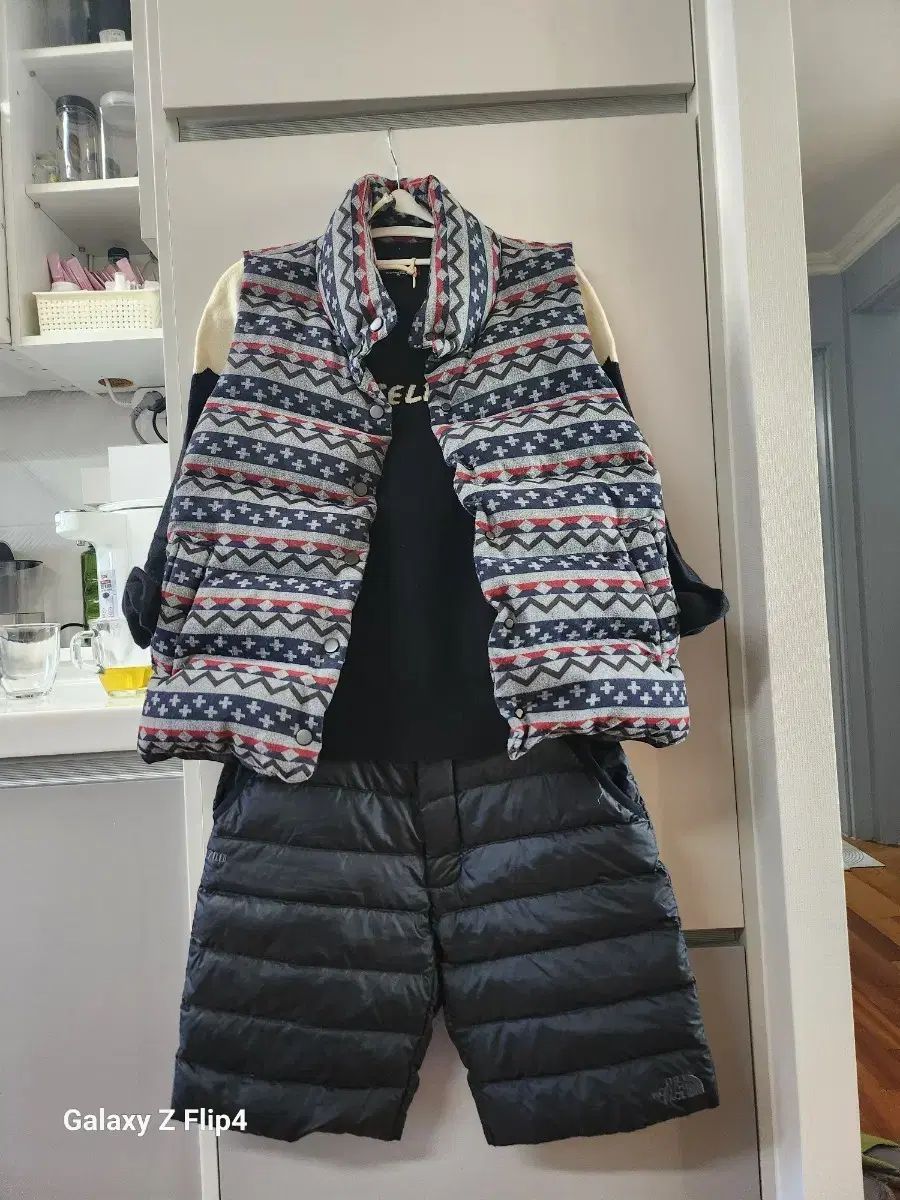 パーリーゲイツ アヒルダウンベスト