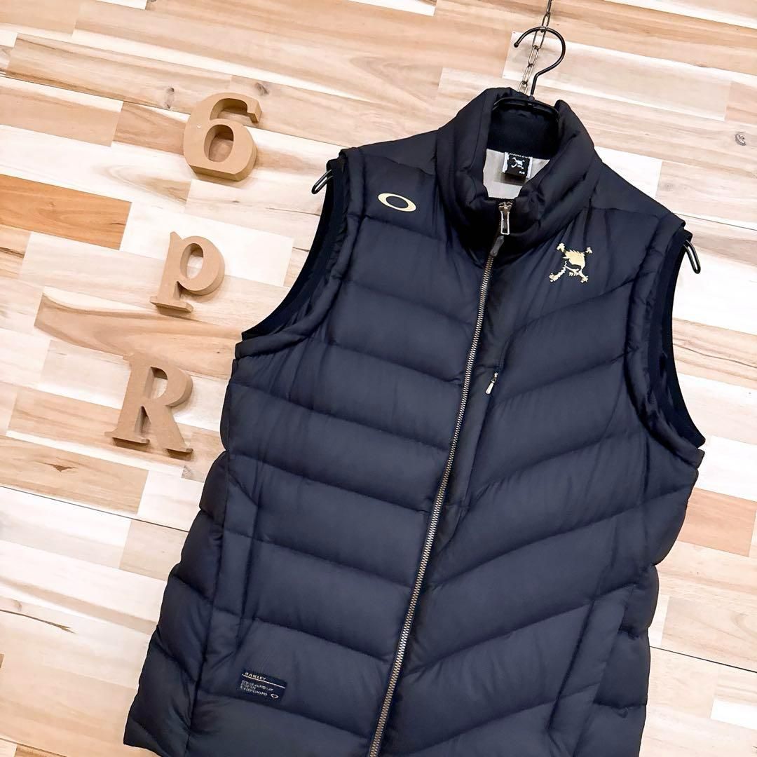 オークリー フェザー ブレンド スカル ロゴ ダウンベスト ゴルフ M 黒×金